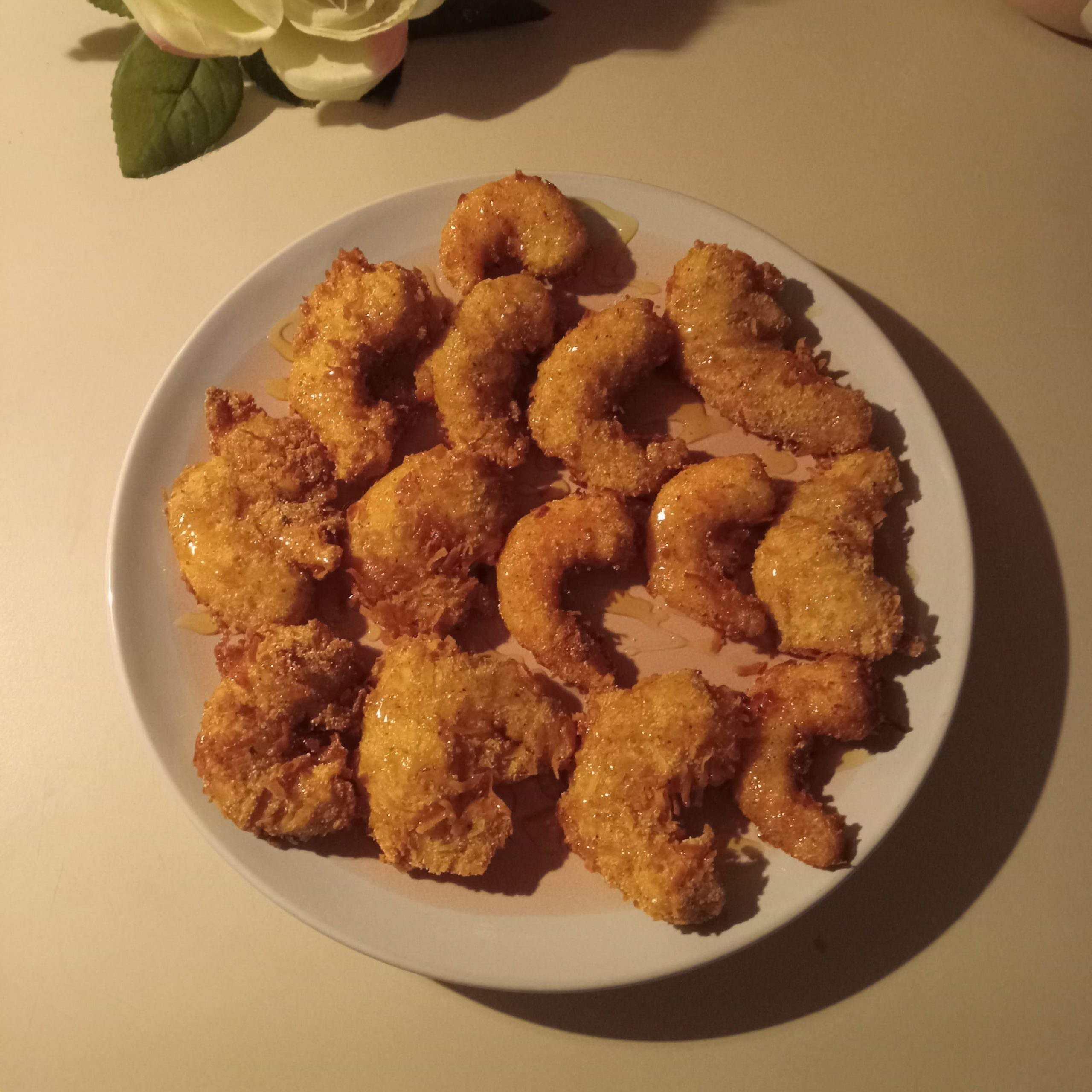 Golden honey coconut shrimp, crispy coconut shrimp, honey coconut shrimp recipe, fried coconut shrimp with honey, coconut crusted shrimp, shrimp appetizer, sweet coconut shrimp, golden coconut shrimp, fried shrimp recipe