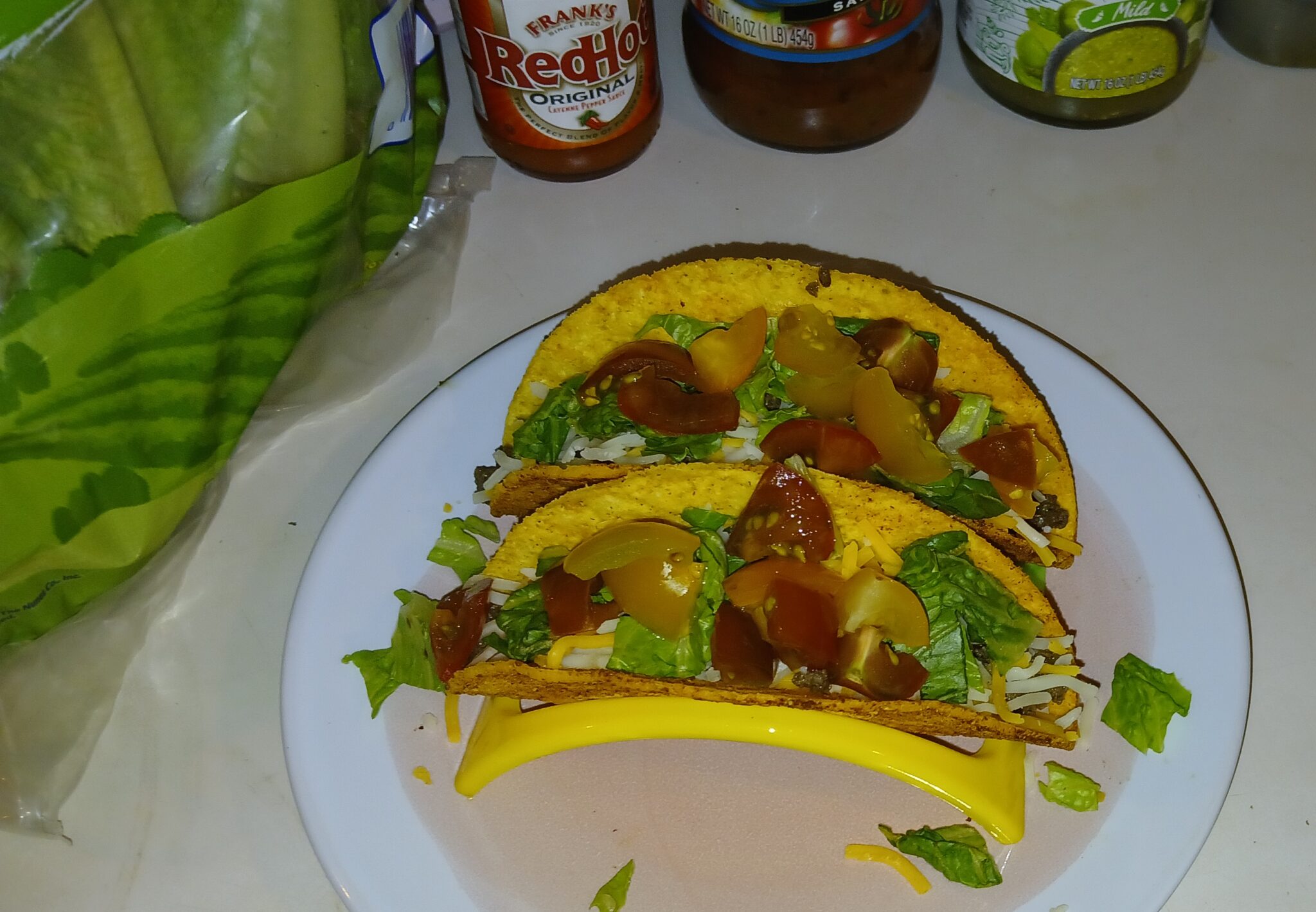 Ground venison taco meat in crunchy taco shell