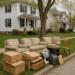 Old furniture piled on a curb during bulk trash pickup